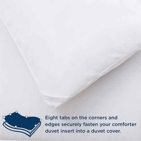 Casa Platino fluffed comforter on styled bed illustrating cozy bedroom appeal