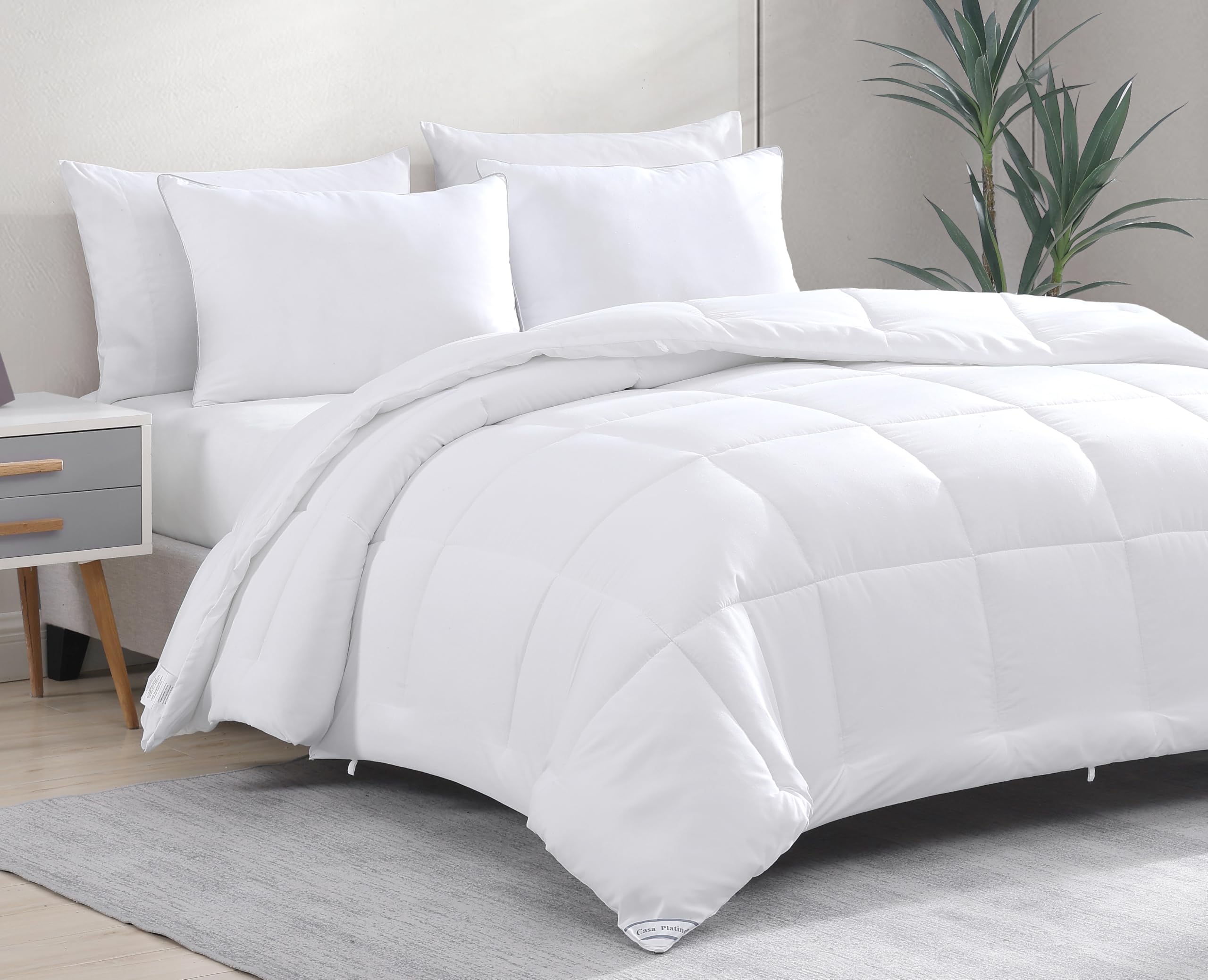 Casa Platino front view of queen comforter showing clean white look and comfort