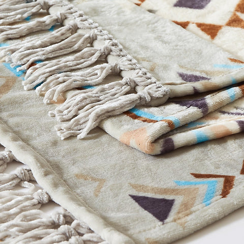CASAAGUSTO draped over bed demonstrating layered bedroom styling and added comfort