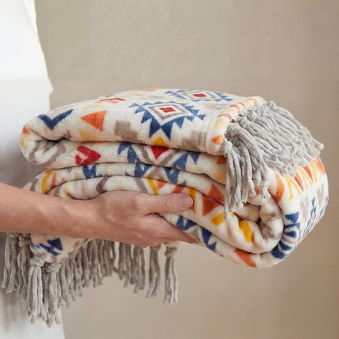 CASAAGUSTO neatly folded on shelf, showing compact storage and easy care