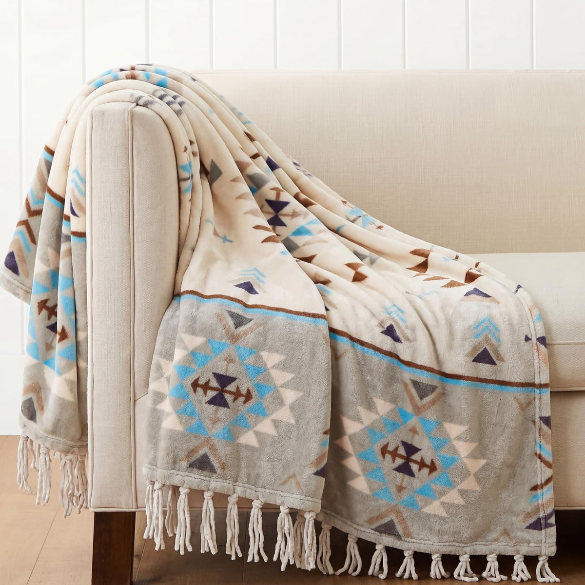 CASAAGUSTO front view of boho tassel throw showing pattern and fringe for instant style
