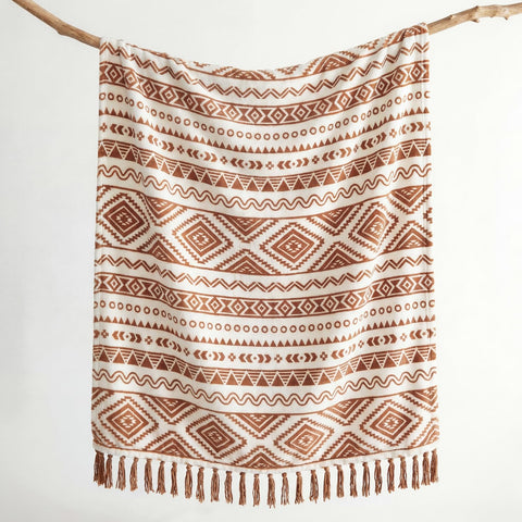 CASAAGUSTO tassel detail close-up highlighting handcrafted look