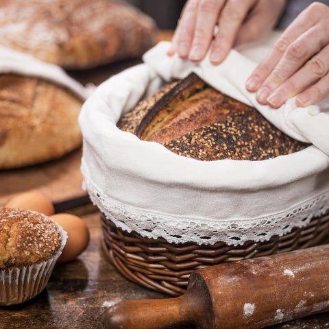 CASADEMA basket with canvas cover and assorted loaves showing dining presentation benefit