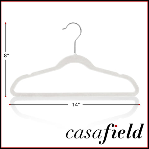 Casafield 14-inch hanger beside child’s shirt for size clarity and fit