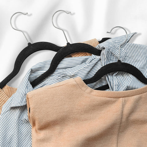 Casafield hanger holding dress, shirt, pants organizes outfits