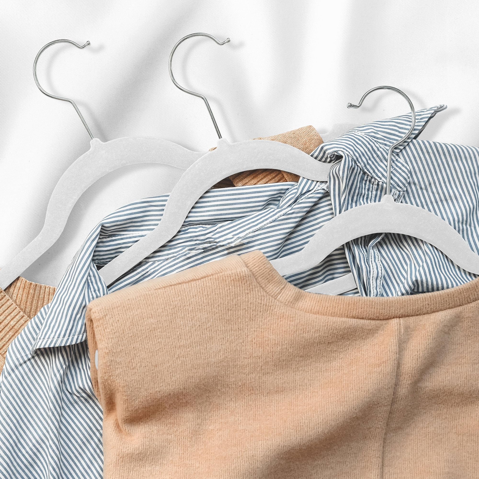 Casafield hangers in a child’s closet organizing outfits for quick access