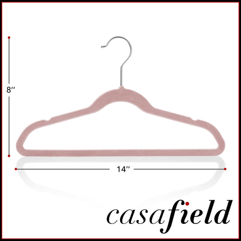 Casafield hanger holding a dress and jeans showing double-duty storage