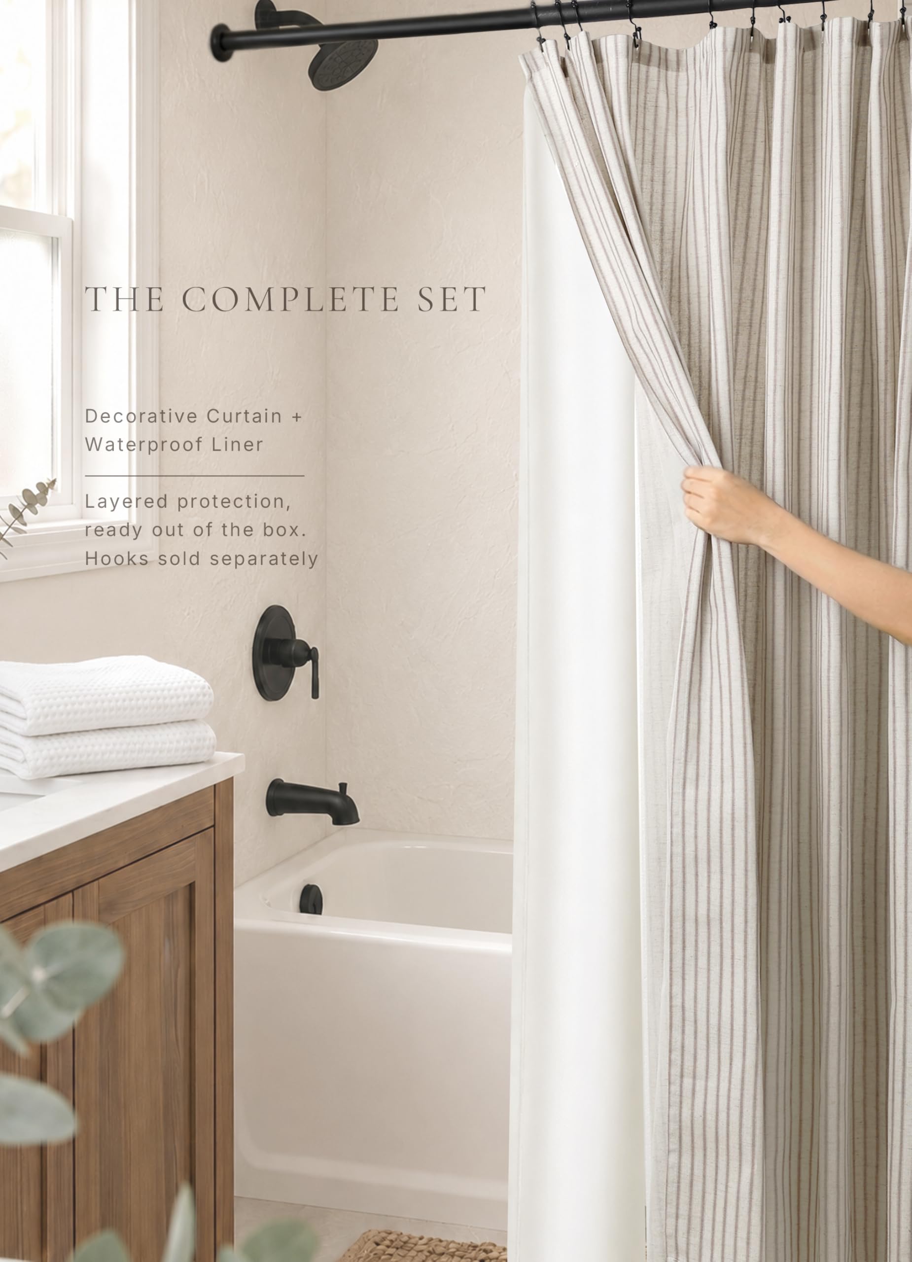 CasaTena curtain hanging in a styled bathroom demonstrating easy installation aesthetic