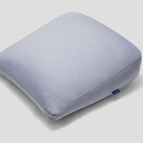 casper full-length gray pillow on bed showing shape and support