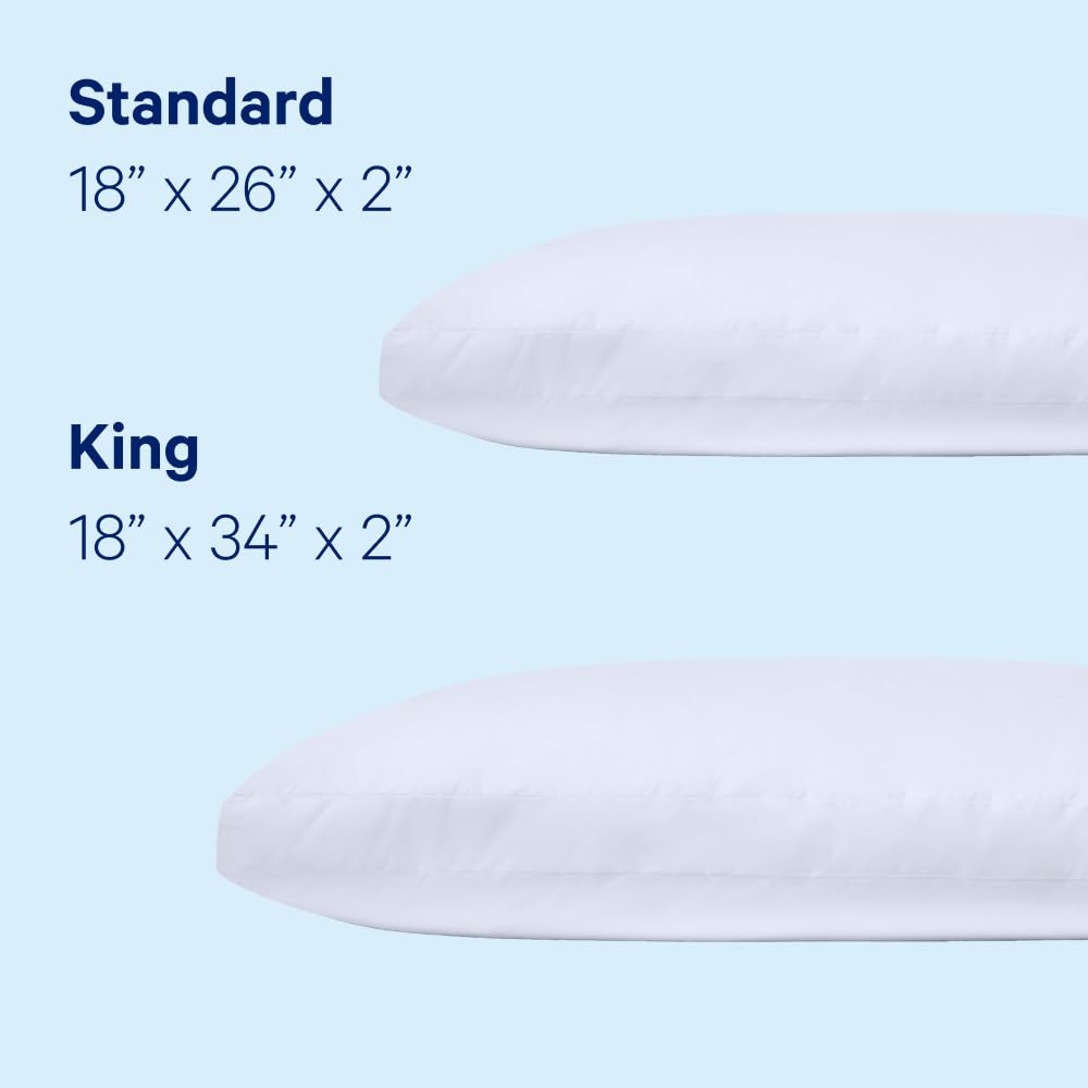 Casper down pillow on made bed lifestyle scene demonstrating cozy comfort and breathable sleep