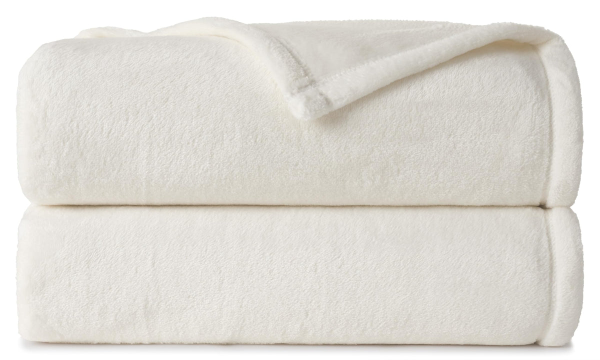 CASUAL LIVING front view of ivory fleece blanket showing full coverage