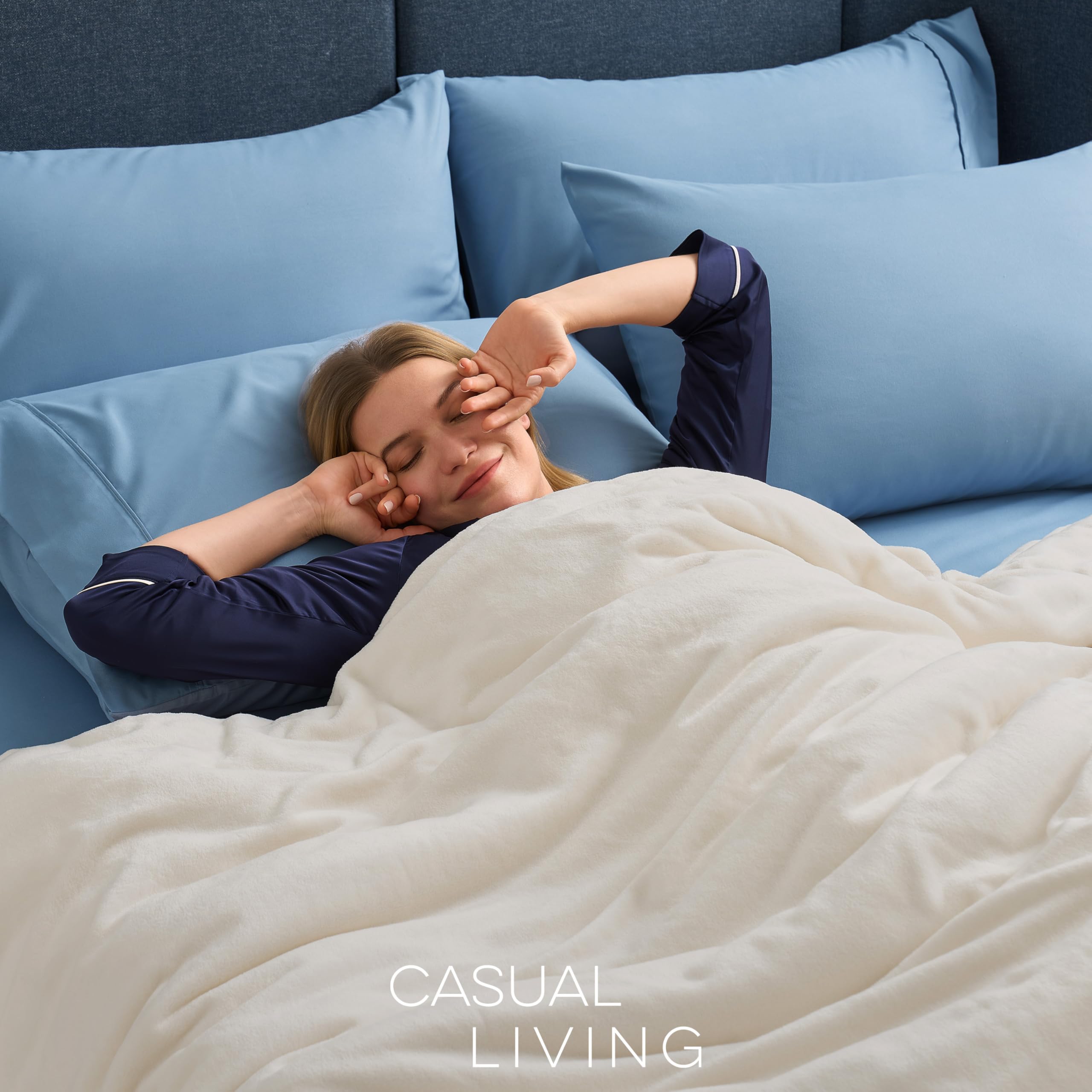 CASUAL LIVING blanket on queen bed providing oversized coverage