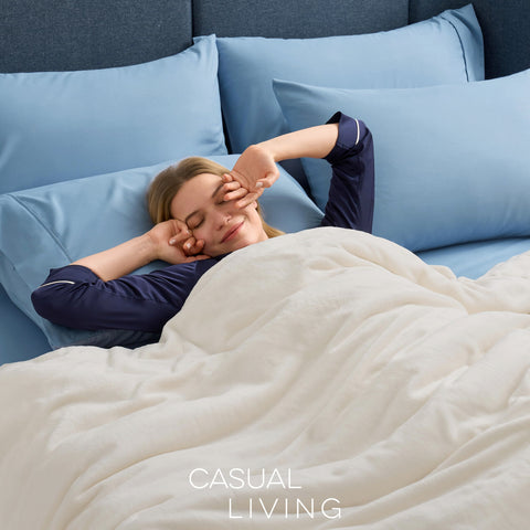 CASUAL LIVING blanket on queen bed providing oversized coverage