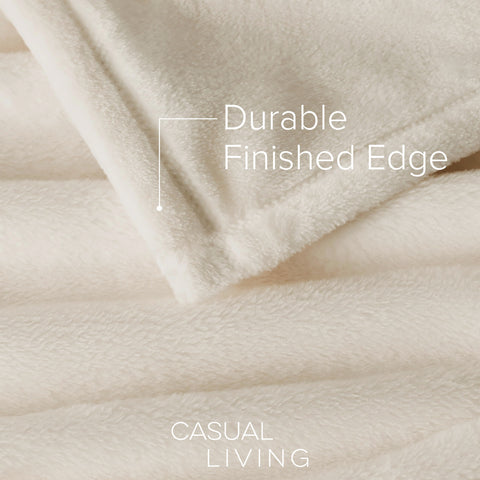 CASUAL LIVING folded blanket stack highlighting convenient storage