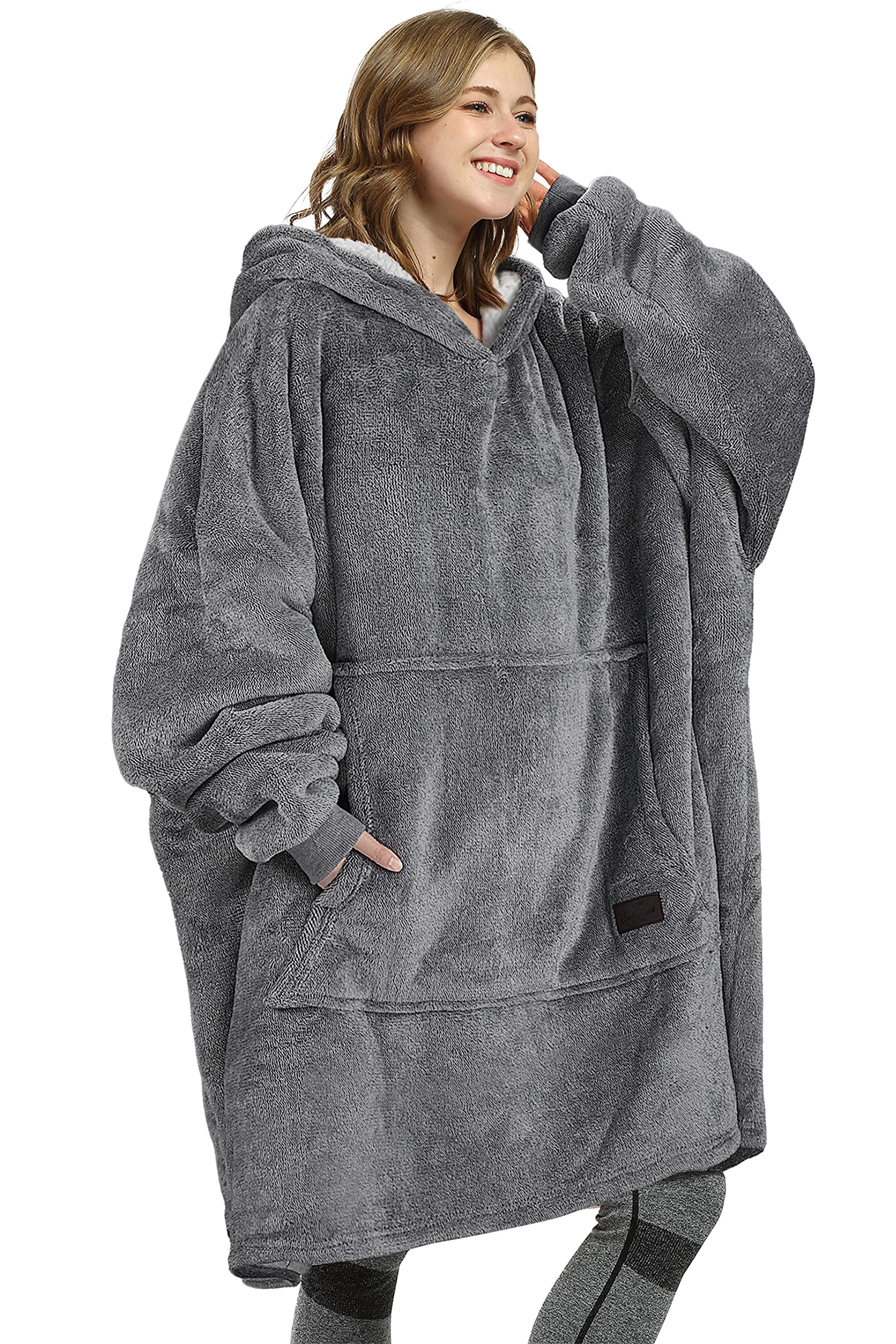 Catalonia folded hoodie blanket packed for travel, demonstrating easy portability