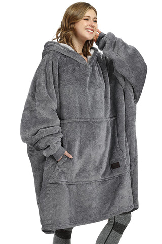 Catalonia folded hoodie blanket packed for travel, demonstrating easy portability
