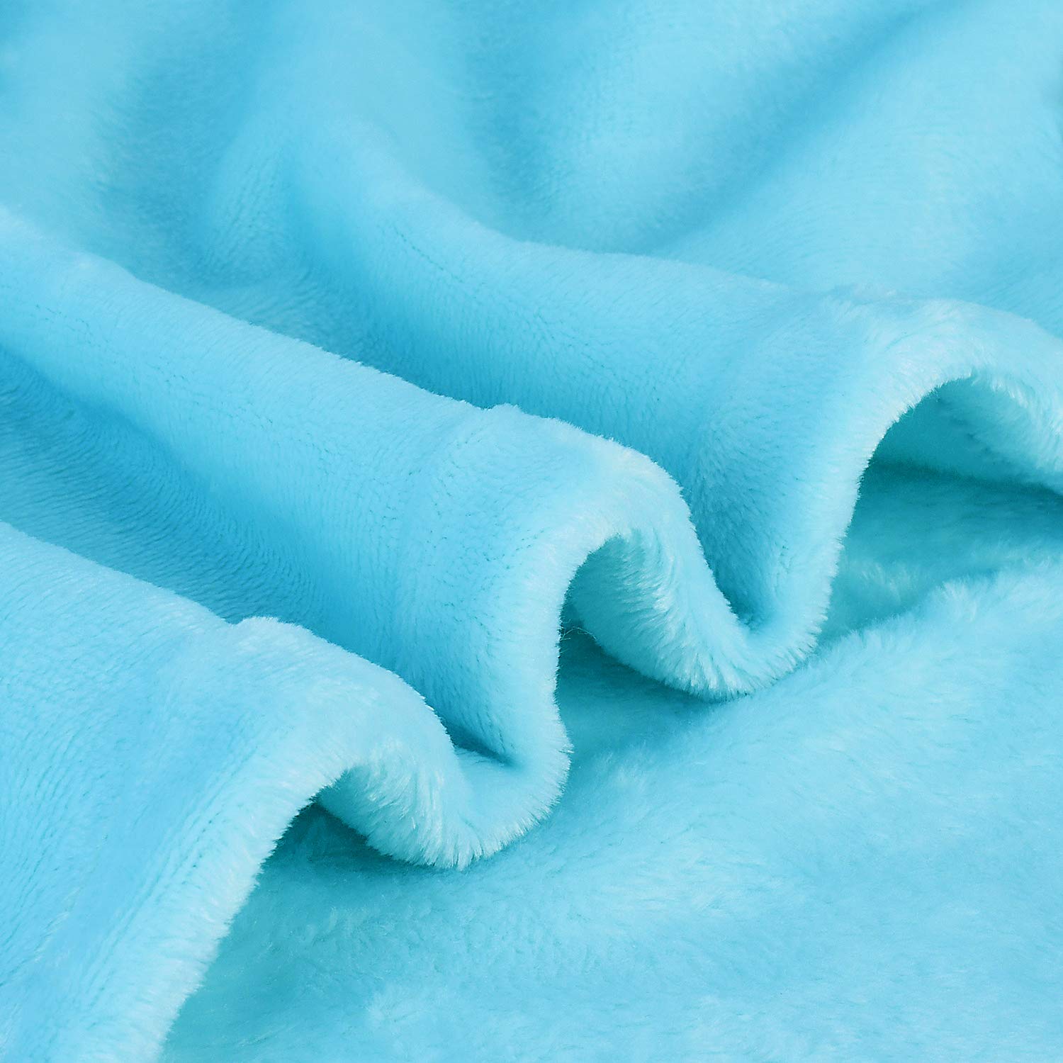 Child wearing Catalonia hoodie blanket at home showing comfortable movement and warmth