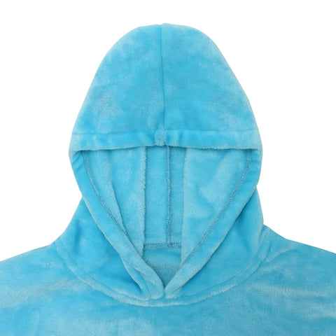 Label and stitching detail on Catalonia hoodie blanket showing durable construction