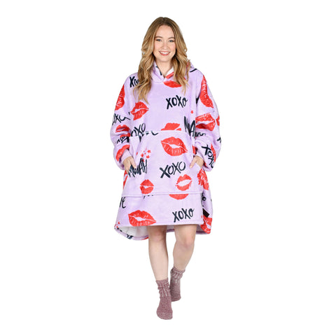 Catalonia blanket hoodie worn at outdoor concert keeping wearer warm