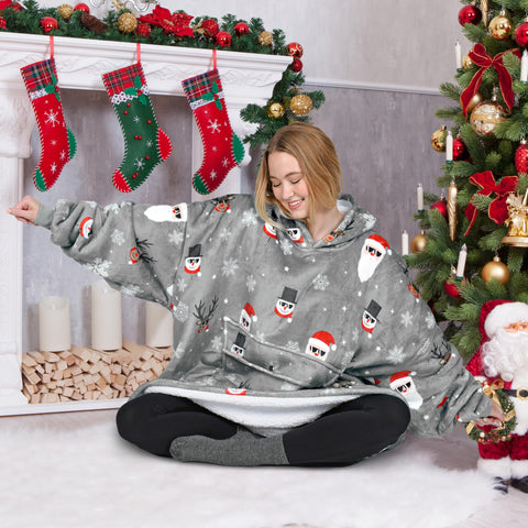 Catalonia model wearing hoodie blanket in living room for cozy everyday use