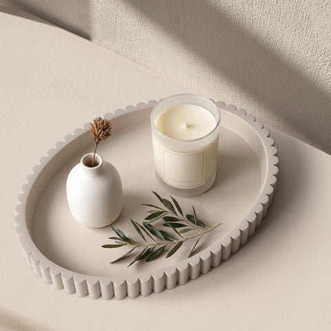 Cathyeen oval tray front view showing cream gray finish and minimalist shape for styling