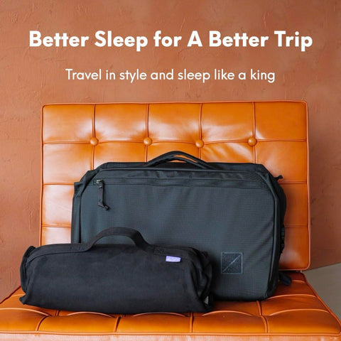 C CUSHION LAB pillow next to hand shows compact travel size advantage