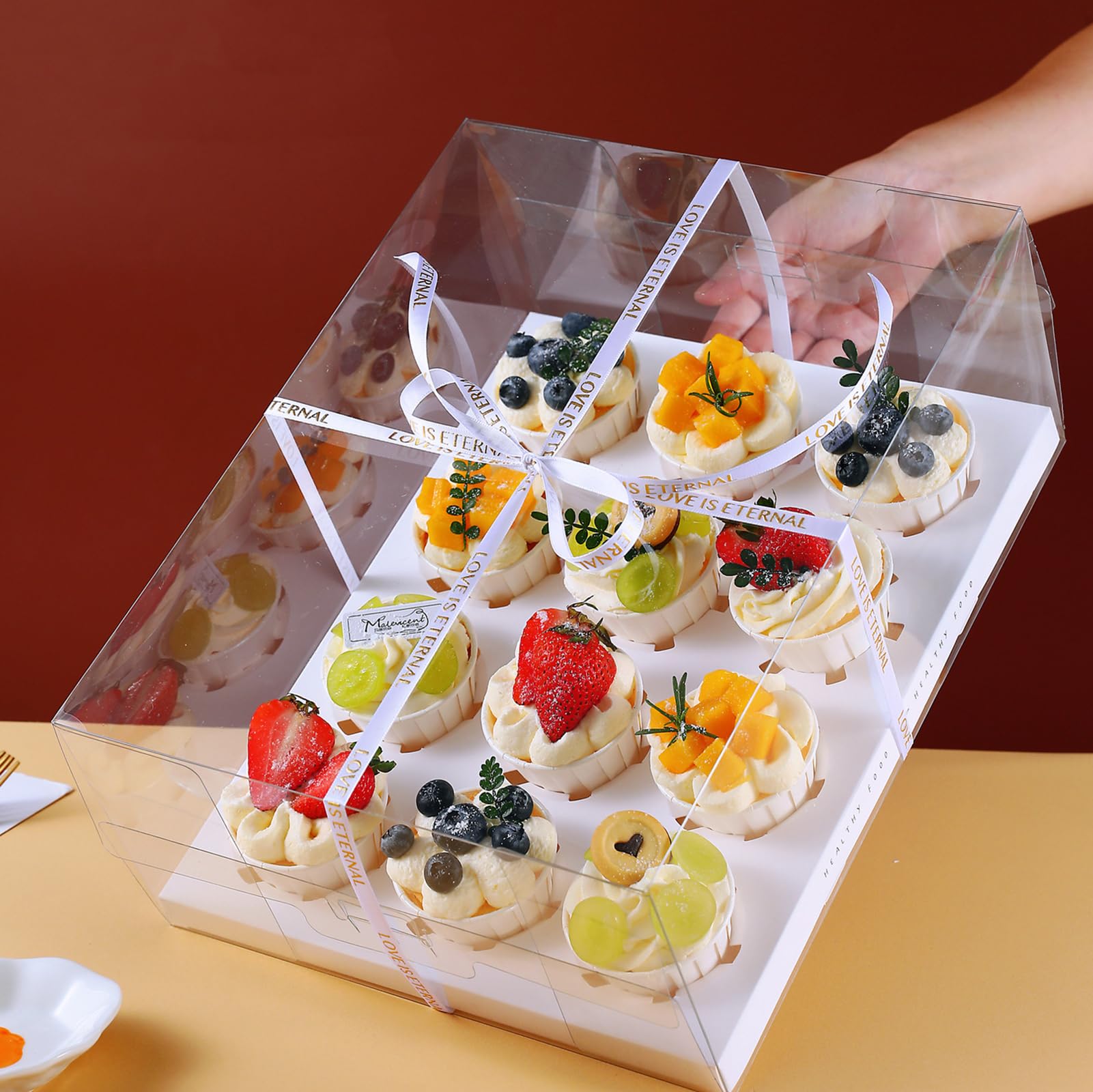 Cedilis table display with boxes in party setting showcasing presentation