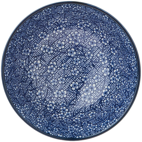 Certified International Chelsea bowl beside a spoon showing size comparison and portion control benefit