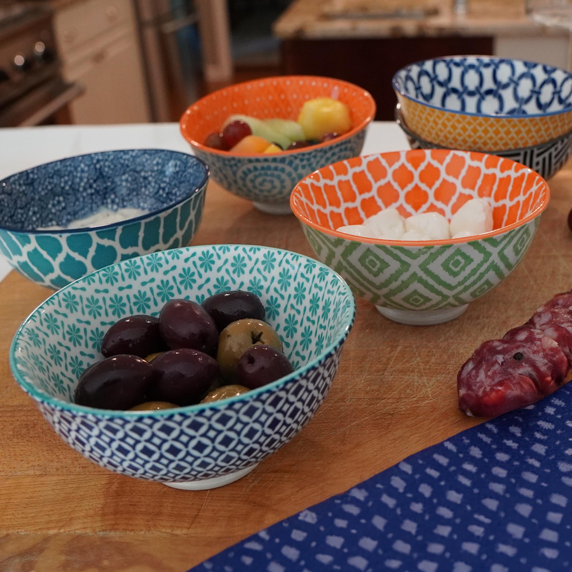 Certified International stacked Chelsea bowls from the side showing space-saving storage benefit