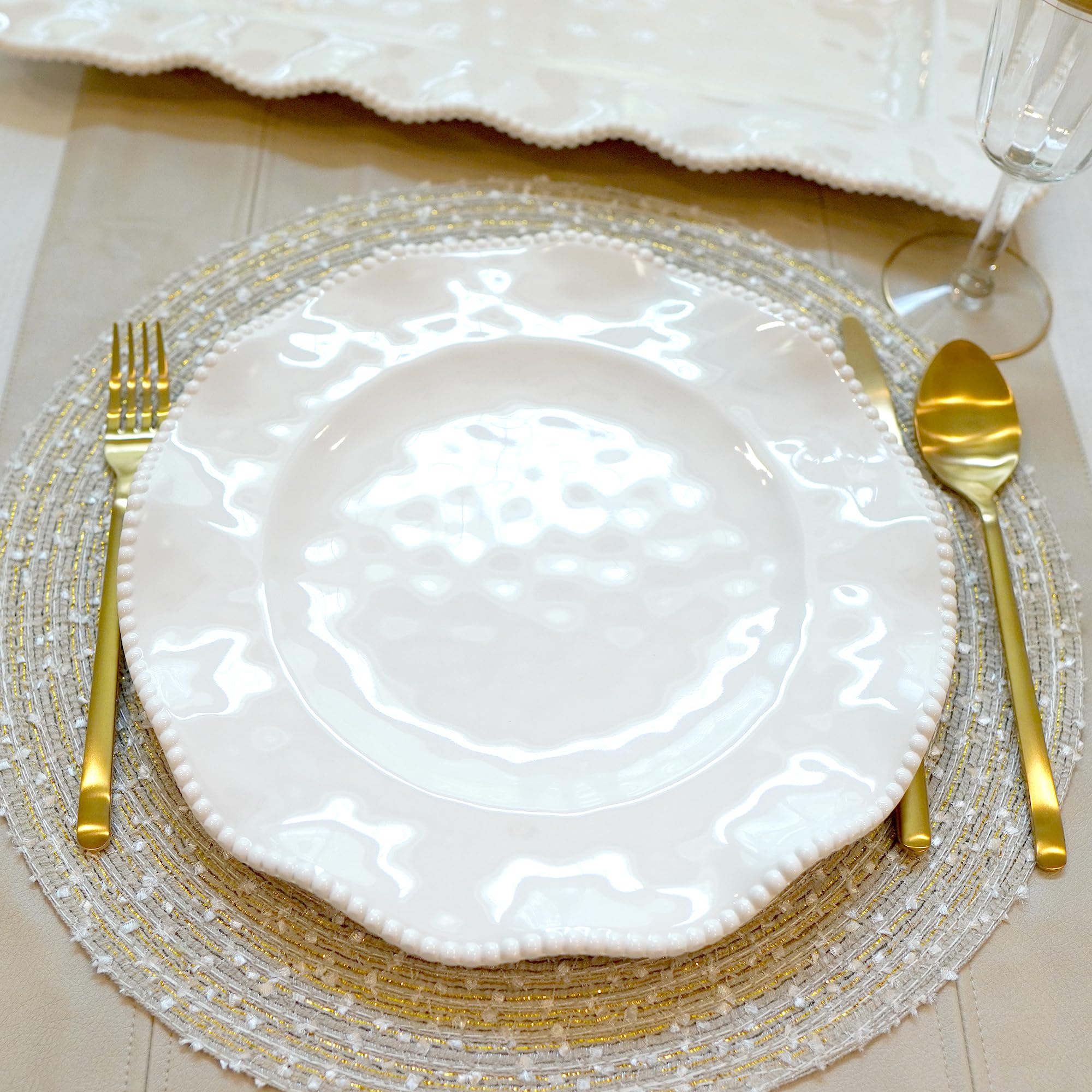 Certified International outdoor table setting with plates showing outdoor-friendly elegance