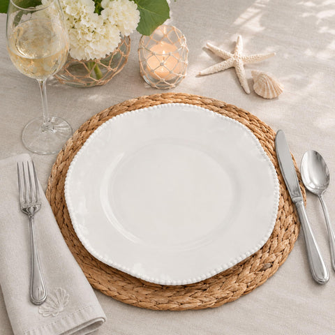 Certified International stacked set of four plates showing compact storage and heavy melamine build