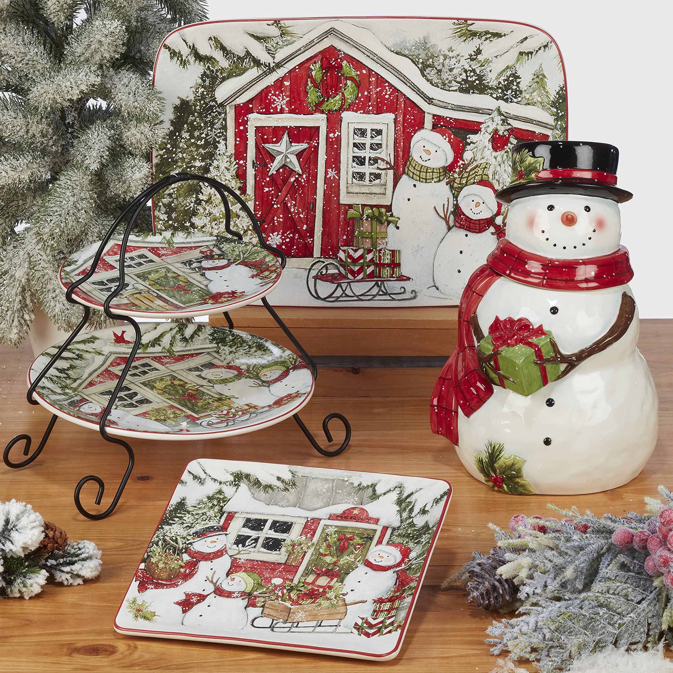 Certified International snowman jar displayed on table adding seasonal centerpiece appeal