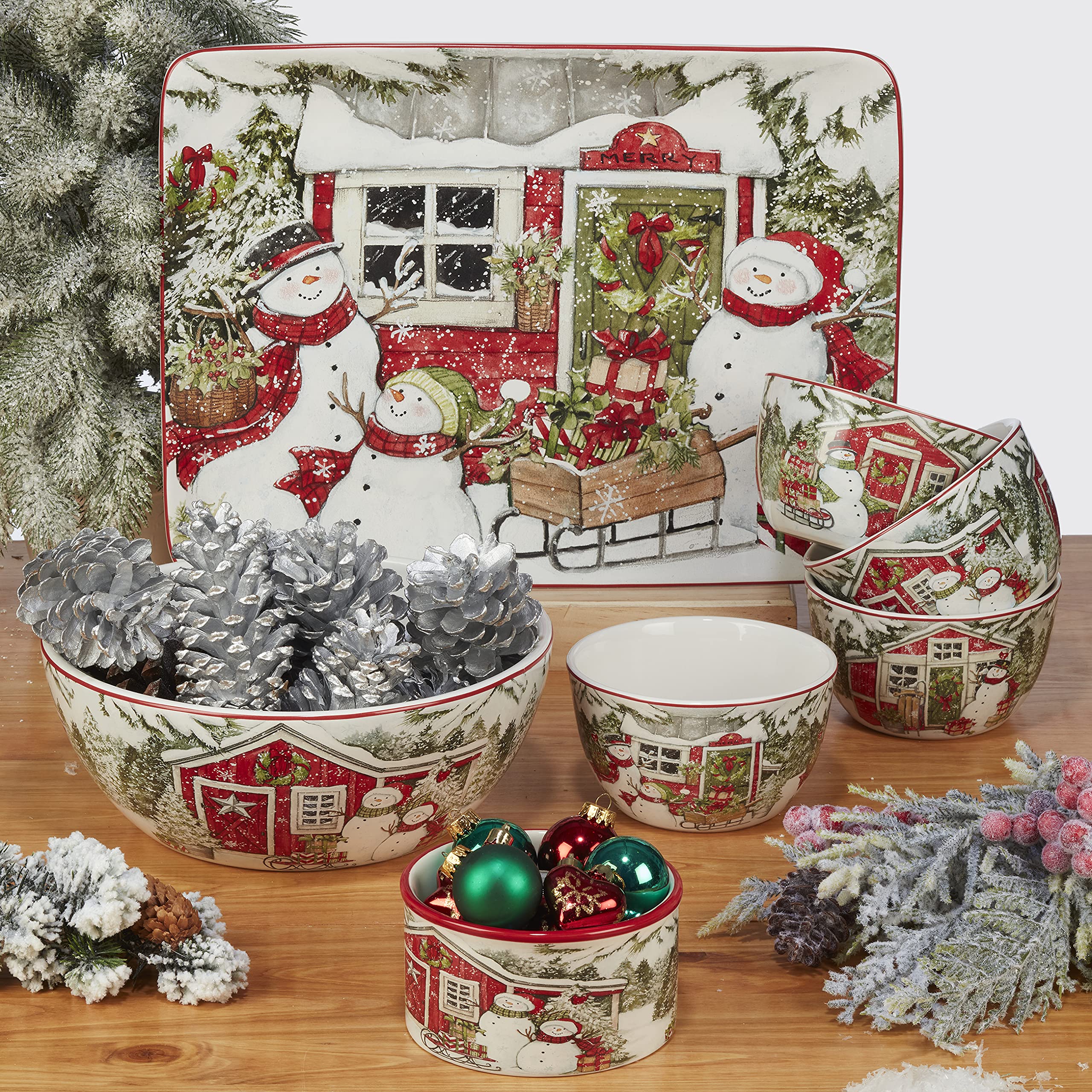 Certified International snowman jar with matching Holiday Magic pieces creating cohesive set