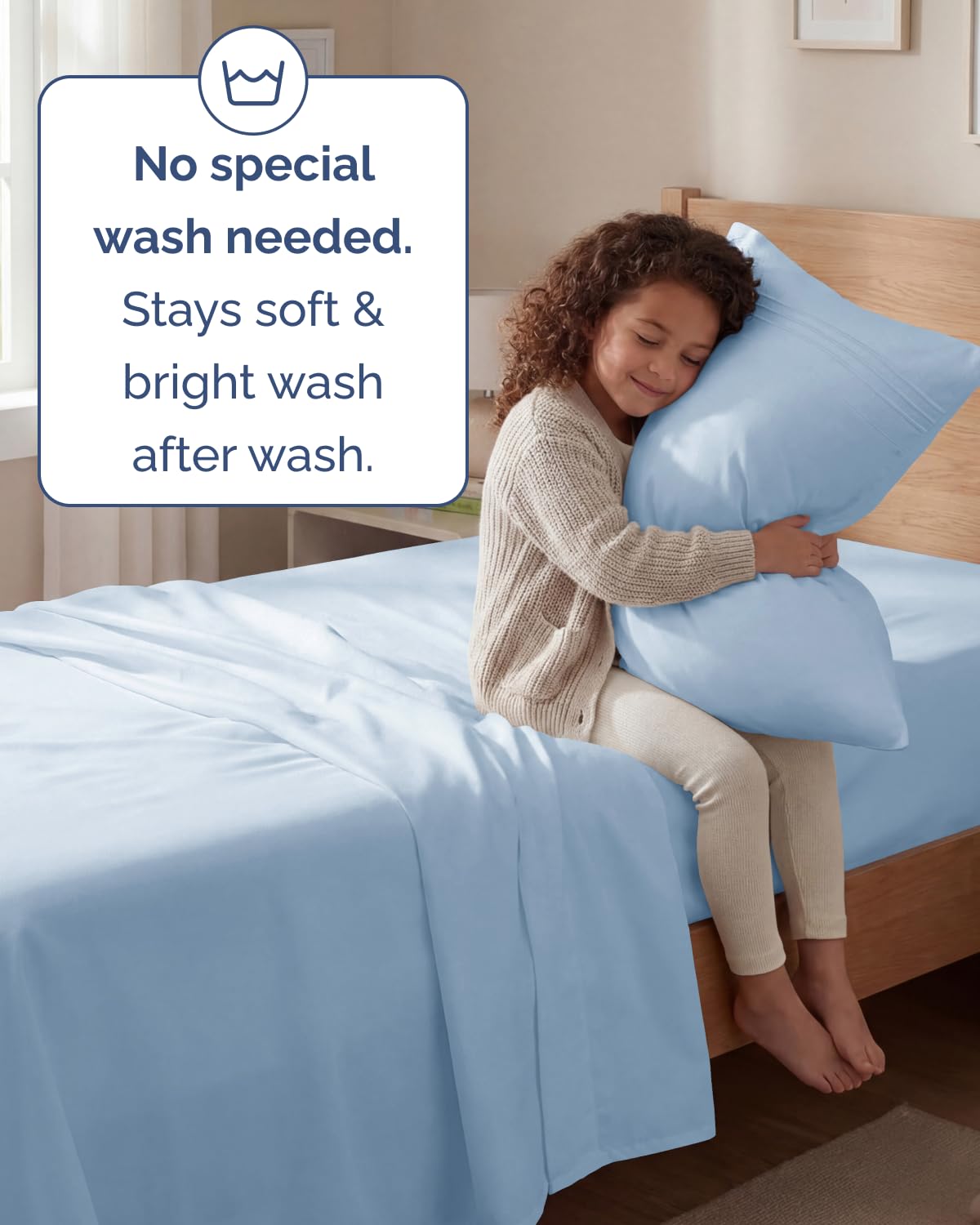 Bedroom scene with CGK Unlimited sky blue sheets creating a calm, inviting sleep space