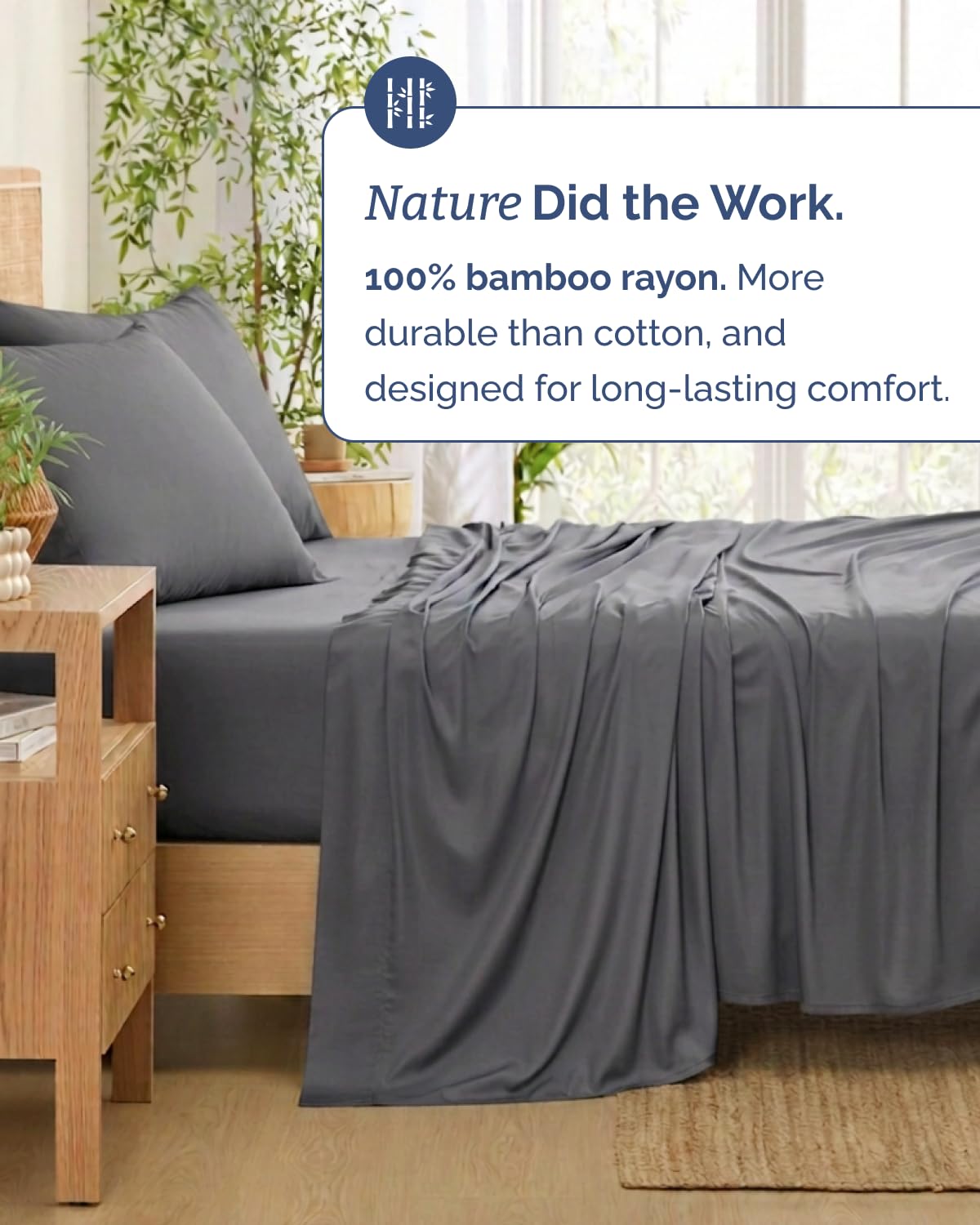 CGK Unlimited styled bedroom with dark grey sheets showing modern, calming aesthetic