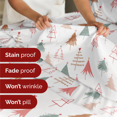 CGK Unlimited sheet set styled on a twin bed showing holiday decor and cozy presentation