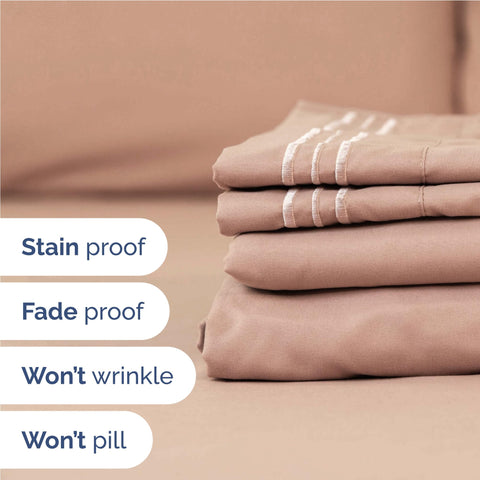 CGK Unlimited flat sheet spread on bed in mauve illustrating full coverage and cooling