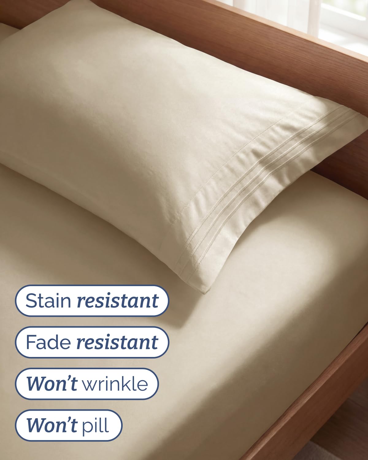 CGK Unlimited flat sheet spread on twin bed highlighting smooth drape