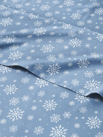 CGK Unlimited front view of boxed blue snowflakes sheet set showing festive design and soft look