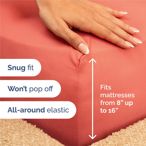 CGK Unlimited flat sheet spread on king bed displaying smooth drape