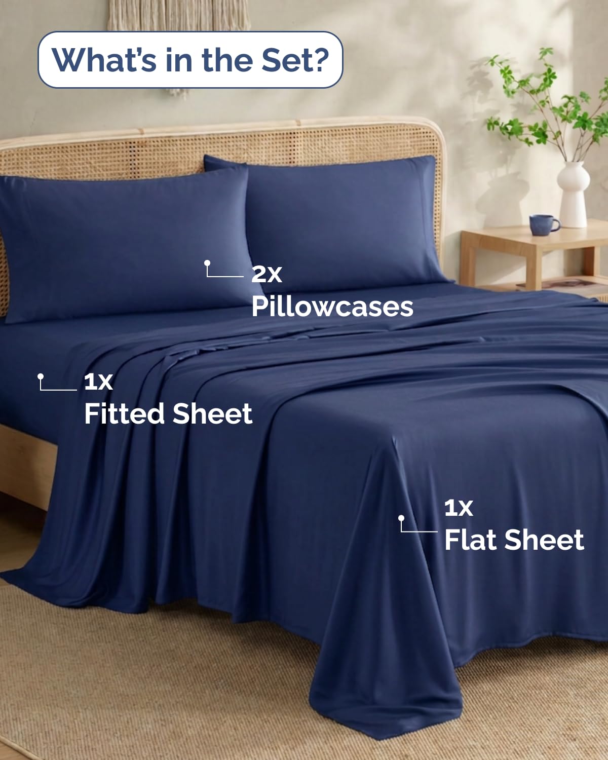 CGK Unlimited navy bed styling in a bright bedroom shows cooling look and comfort