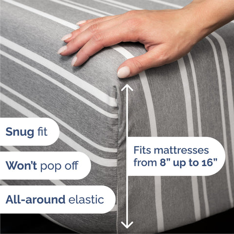 CGK Unlimited flat sheet spread on a queen bed showing full coverage and neat drape