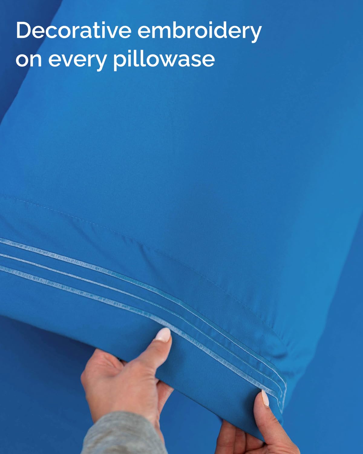 Hand pressing CGK Unlimited brushed microfiber to show soft feel and breathable fabric benefit