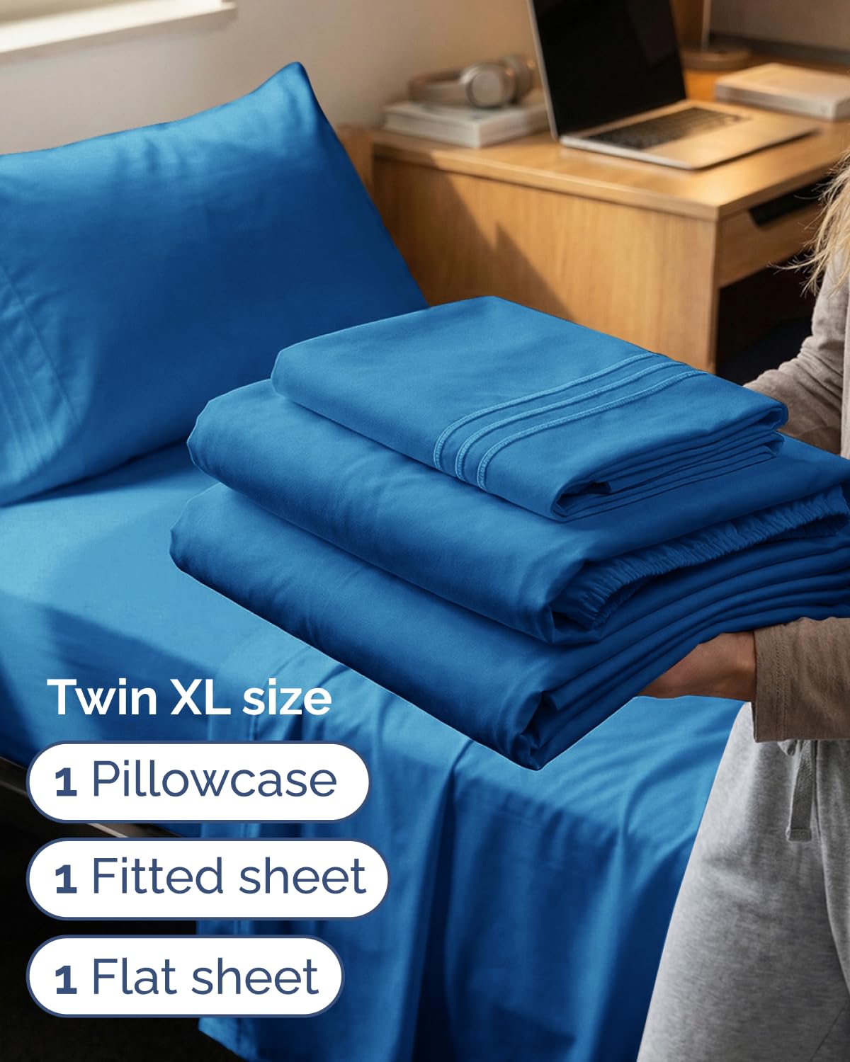 Neatly folded CGK Unlimited royal blue flat sheet emphasizing compact storage and easy packing