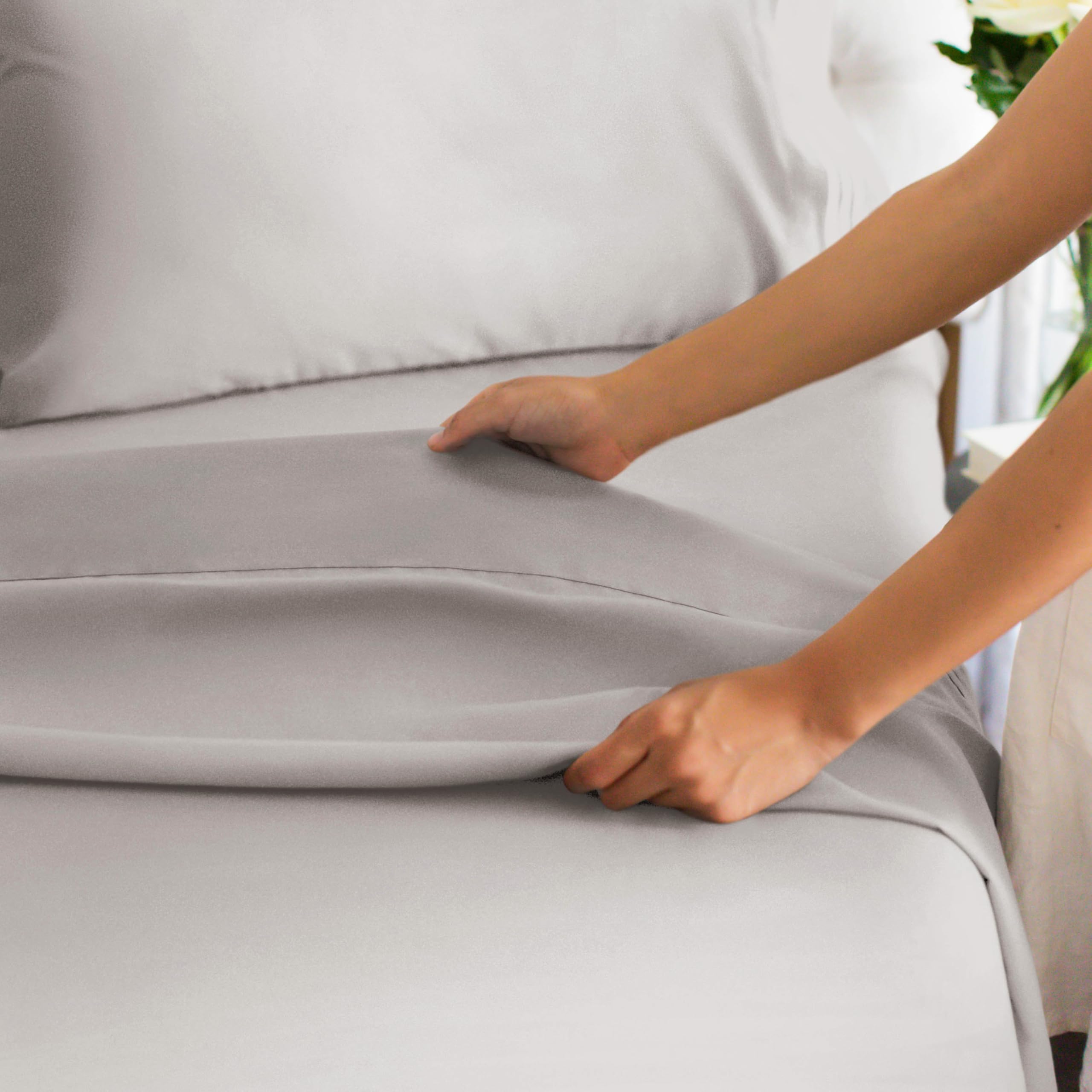 CGK Unlimited fitted sheet on mattress showing fit up to 18 inches for stability
