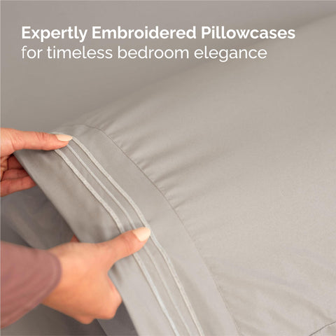 CGK Unlimited bed scene with sheets in use highlighting cozy bedroom styling and everyday ease