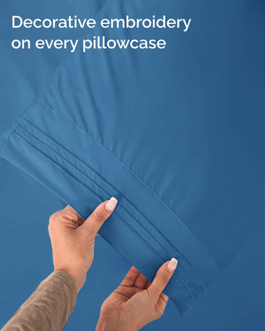 CGK Unlimited hand touching sheet texture showing breathable, comfortable feel