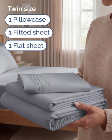 CGK Unlimited flat sheet spread across bed showing smooth drape and coverage