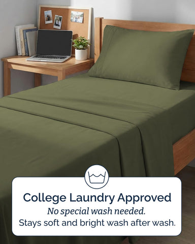 CGK Unlimited styled dorm bed with sheets showing cozy, dorm-ready benefit