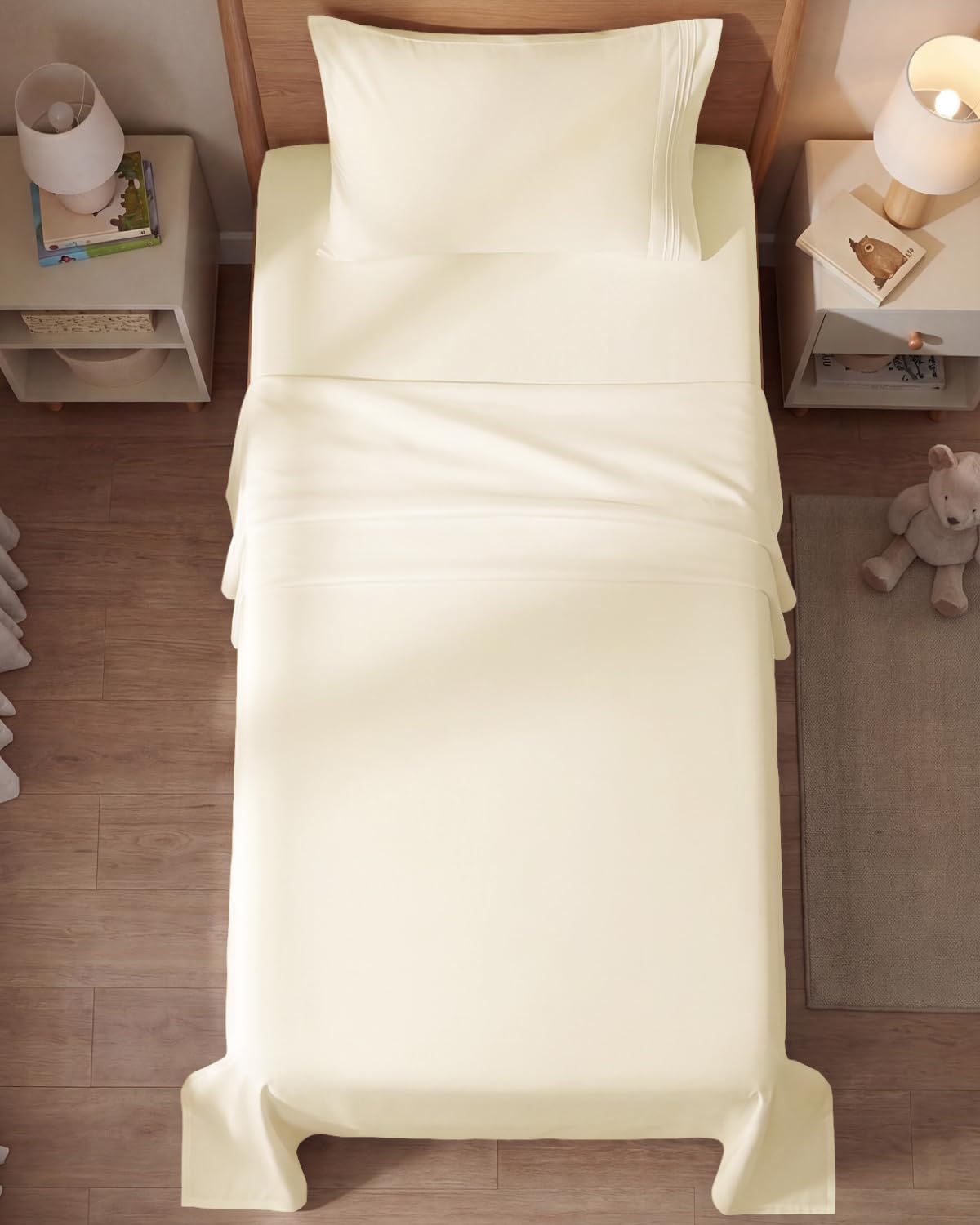 CGK Unlimited styled bed in bedroom showing neutral off-white decor benefit
